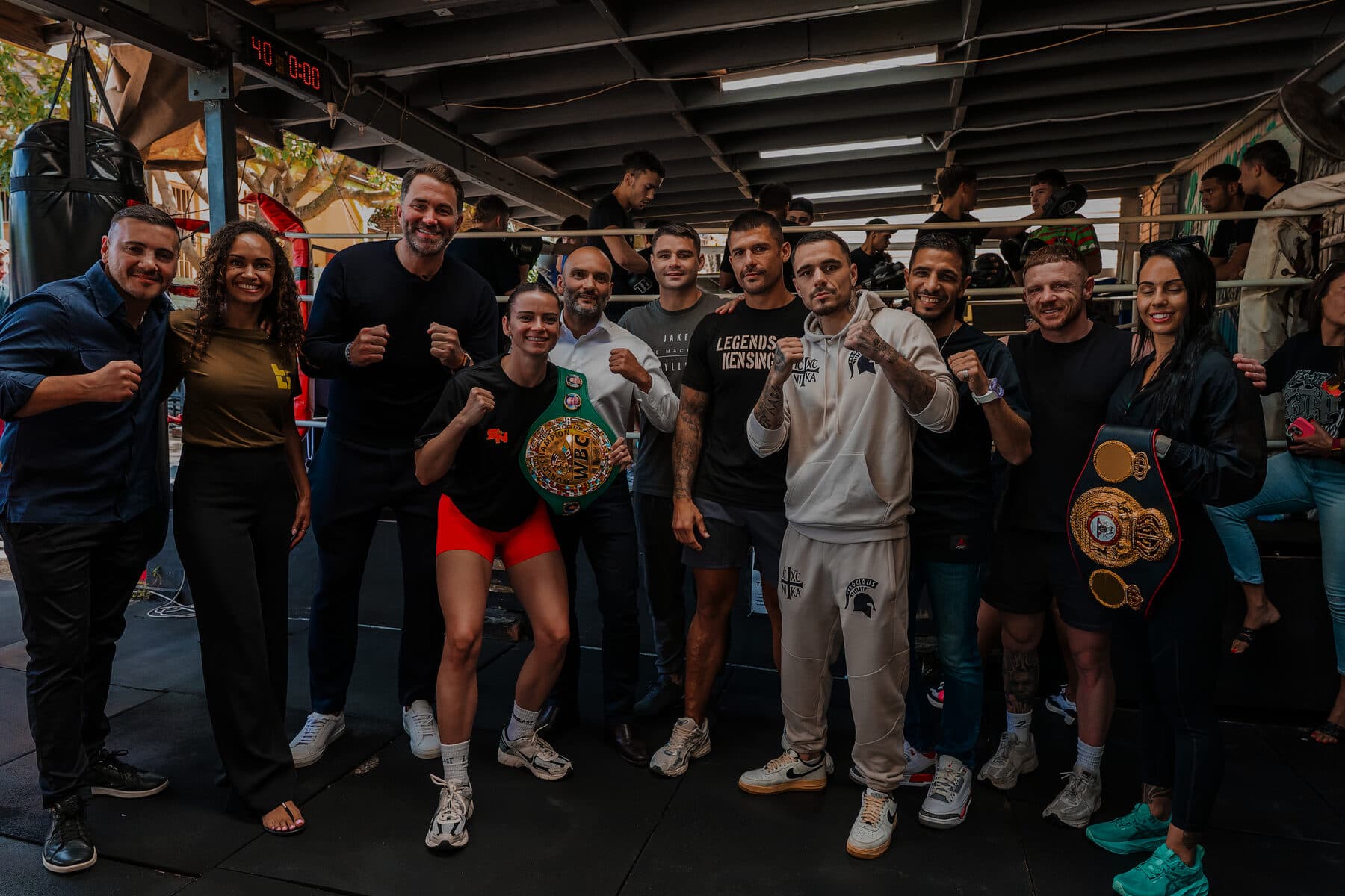 Fight team members together on the mats